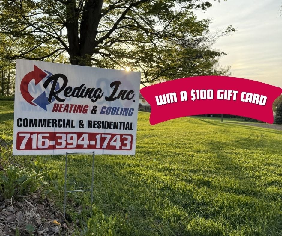 Reding Inc. Heating & Cooling lawn sign in a yard at sunset with a Win a $100 Gift Card banner